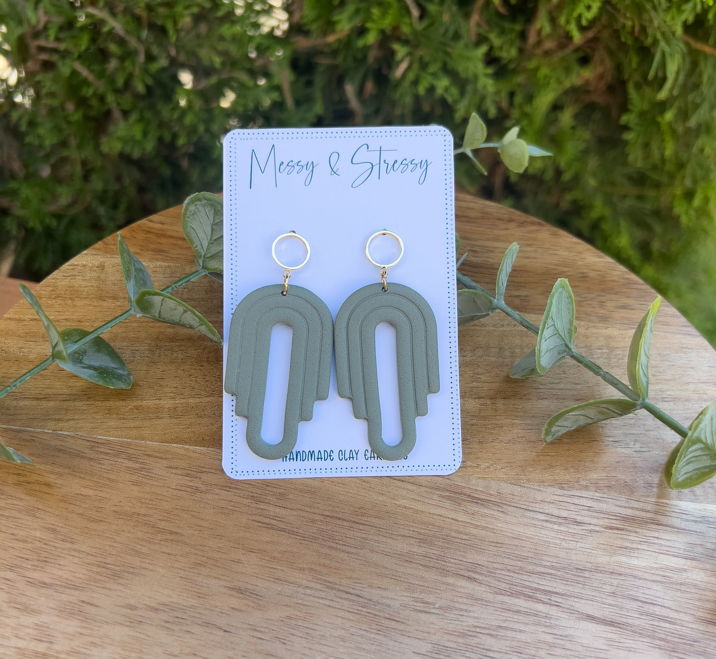 Gold Circle Textured Arches Dangle